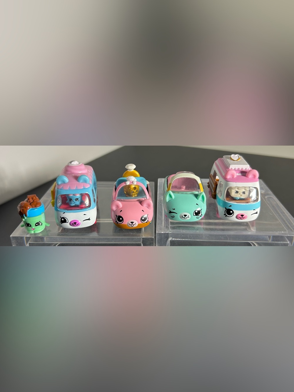 4 Die Cast Shopkins Cutie Cars & 1 Shopkin Figure.